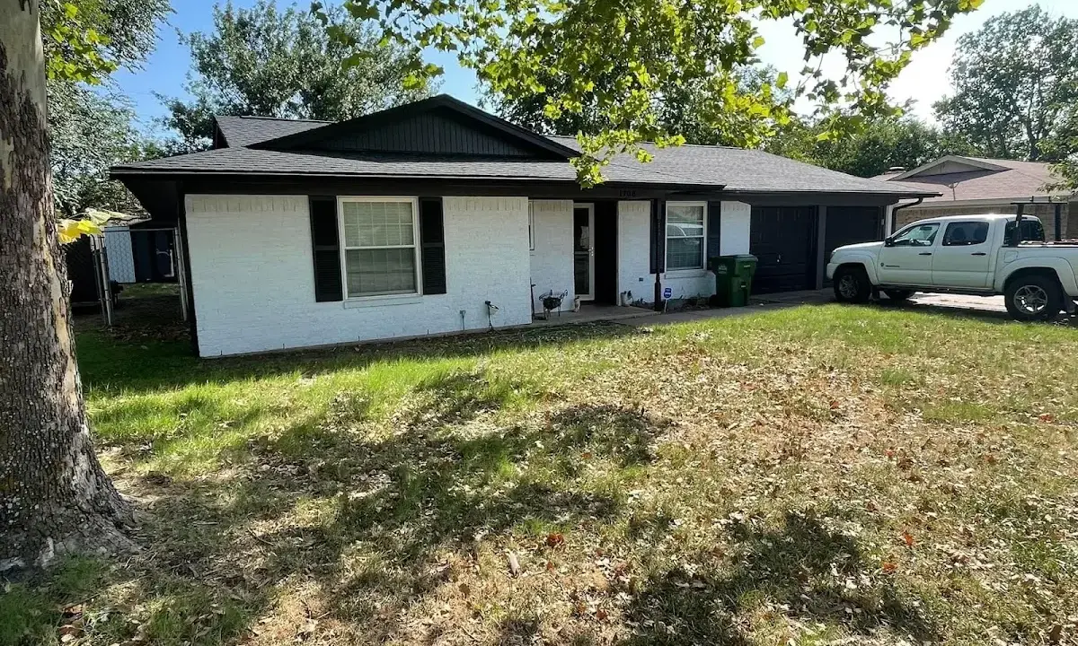 Professional roofing crew working on a residential roof in Ocean City